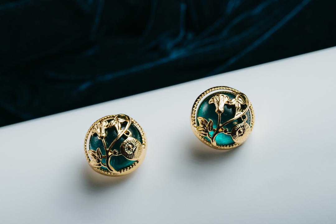 Vintage Floral Stud Earrings – Gold Botanical Round Earrings with Green Enamel Accent