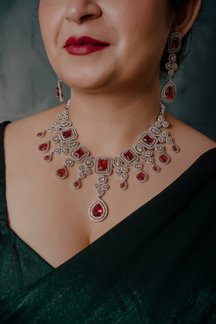 Royal Red Stone Silver Necklace Set – Designer Bridal Jewelry with Statement Earrings